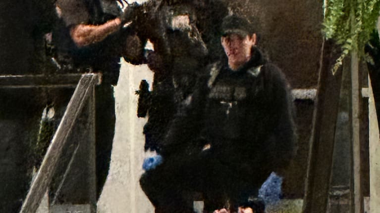 Members of law enforcement control shooting suspect Cole Tomas Allen during the White House Correspondents Dinner.