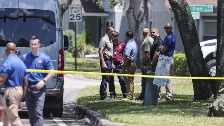 Detectives with the Hillsborough County Sheriff's Office join an investigation inside the Lake Forest subdivision of Tampa, Fla., on Friday, April 24, 2026