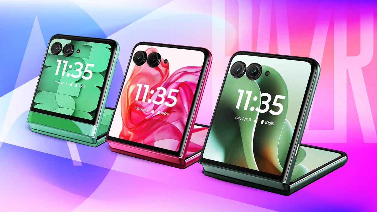 Three Razr phones are lined up. They are partially folded, with one side sitting up straight, displaying the time.