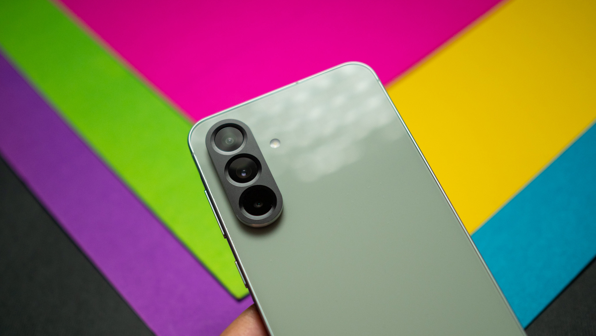 Samsung Galaxy A56 against a colorful background