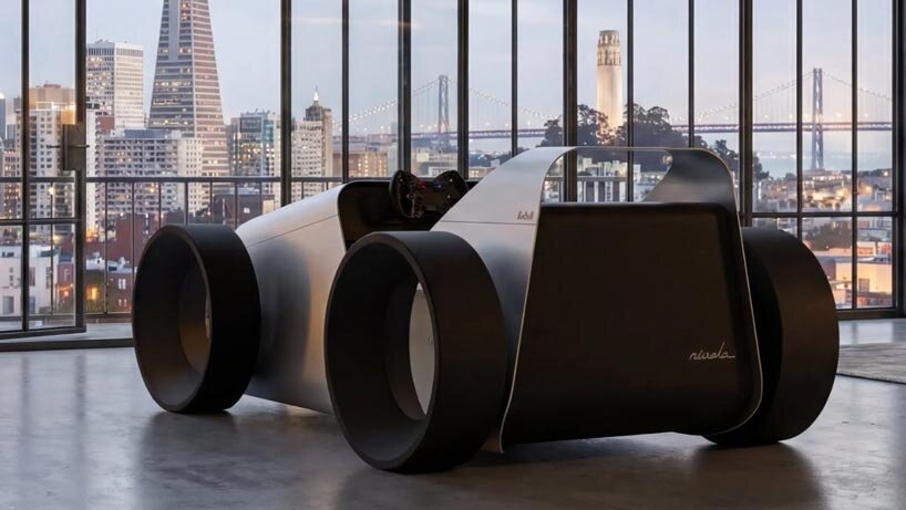 toy car aesthetics inform domestic driving simulator made of curved aluminum and plywood - 1