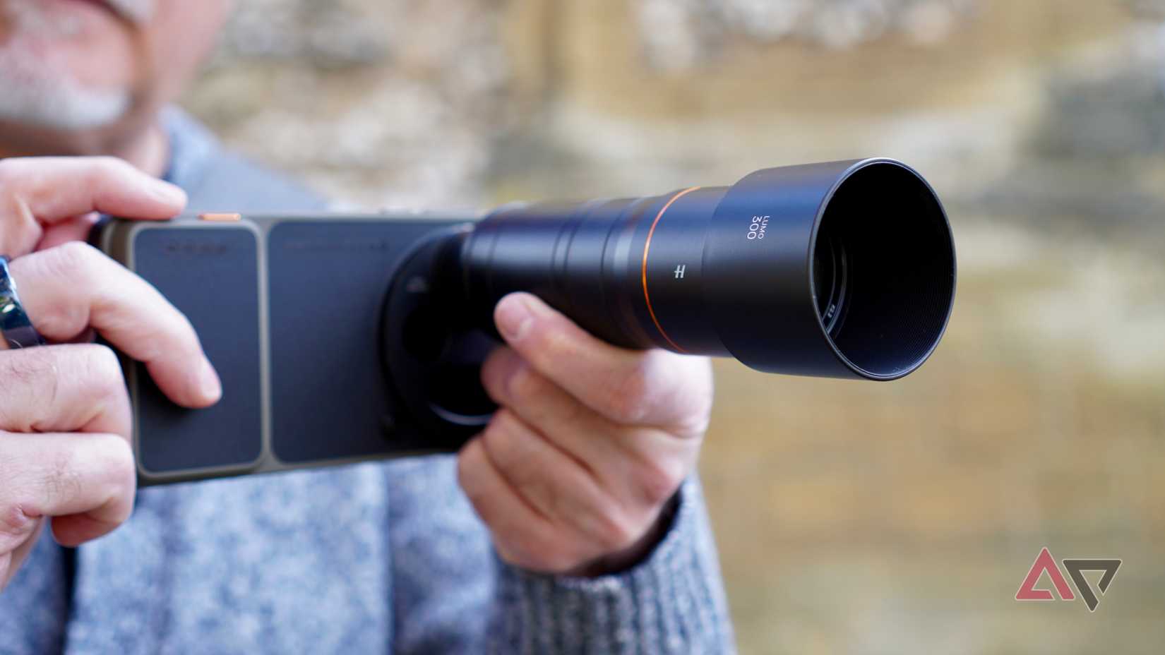 A person taking a photo with the Oppo Find X9 Ultra
