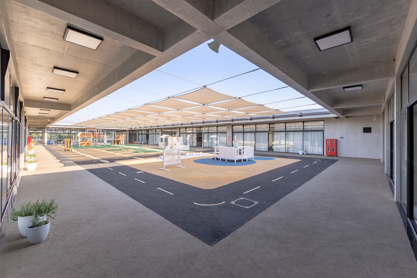 open courtyards and evolving green facades turn hyderabad school campus into living forest - 6