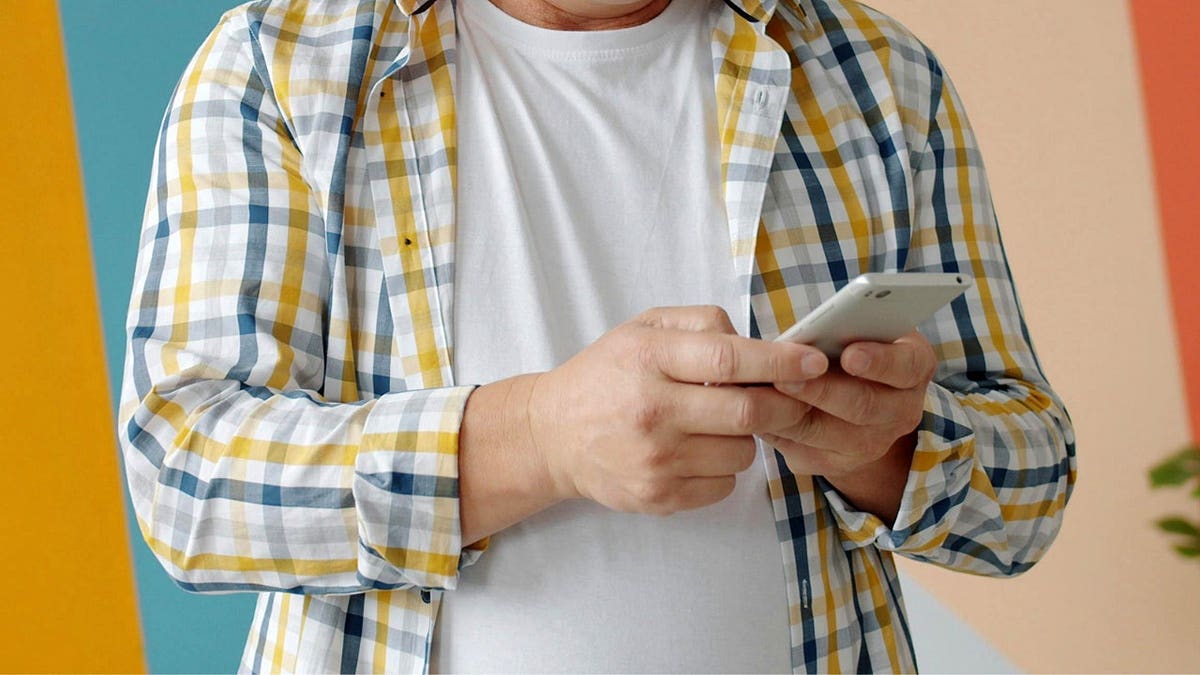 A person scrolling on their phone