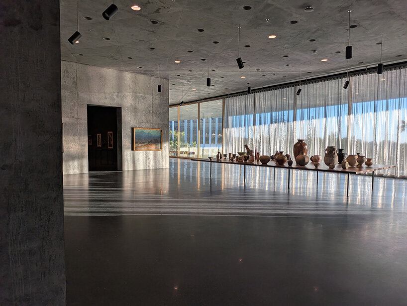peter zumthor's david geffen galleries open at LACMA as a sweeping glass-and-concrete arc - 7