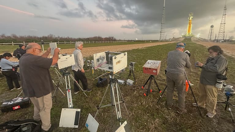 Photographers set up remote cameras to capture the launch of NASA's Artemis II SLS (Space Launch System) rocket with the Orion spacecraft is seen at Launch Complex 39B at the Kennedy Space Center