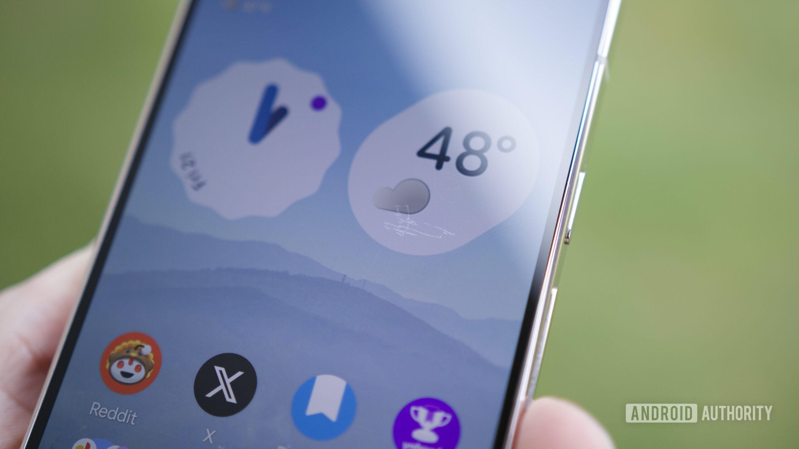 A close-up photo of a Pixel 10 Pro with scratches on its screen.