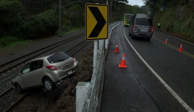 Car crashes onto train tracks in Wellington