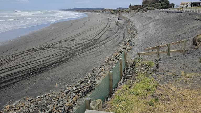 Hundreds of poles and backfill in place for the construction of Sunset Beach’s sea wall.