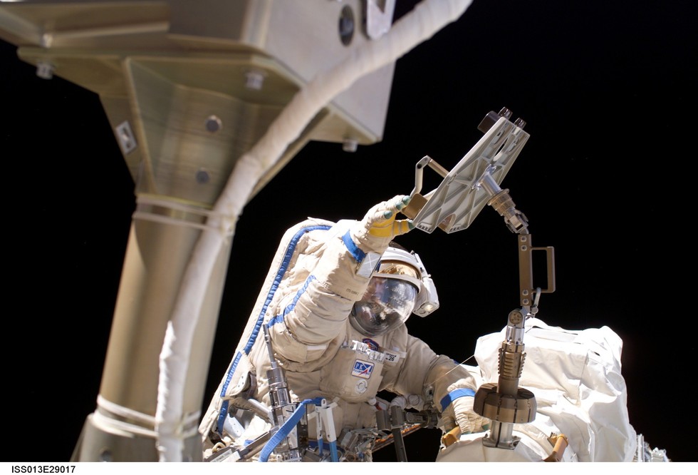 Williams uses the Russian Orlan spacesuit during a spacewalk on Expedition 13.