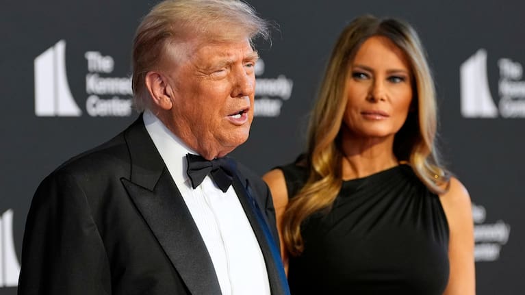 President Donald Trump and first lady Melania Trump arrive to view opening night Les Miserables.