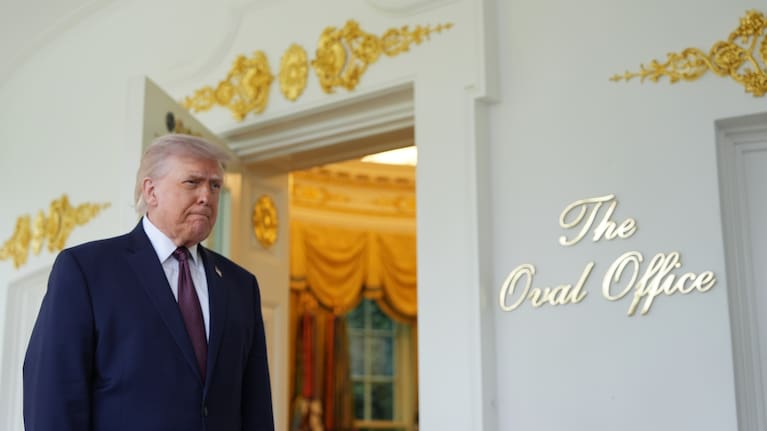 President Donald Trump speaks outside the Oval Office of the White House.
