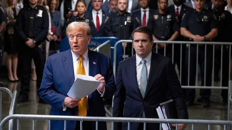 President Donald Trump, stands with then-defense attorney Todd Blanche, May 14, 2024