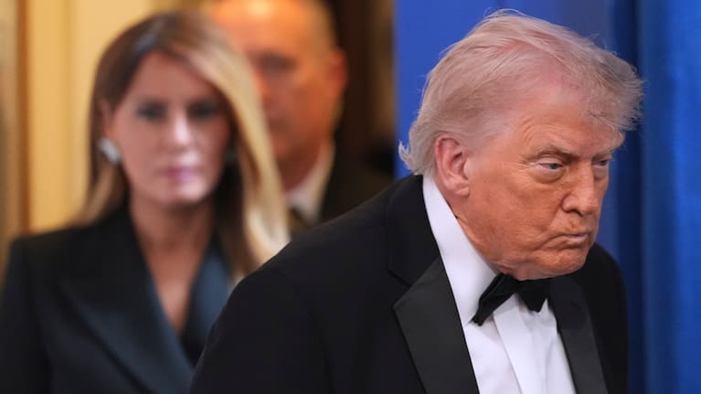 President Donald Trump with first lady Melania Trump, walks in to speak in the James Brady Press Briefing Room at the White House.