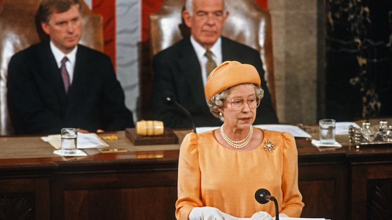 During a State Visit, British monarch Queen Elizabeth II (fore) addresses a Joint Session of the Congress in the House Chamber at the US Capitol, Washington DC, May 16, 1991.