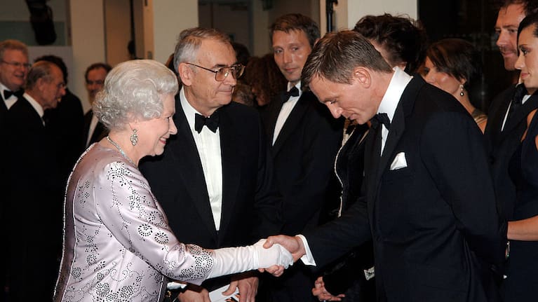 Queen Elizabeth II meets actor Daniel Craig,bowing in respect for protocol, at the premiere of the 21st Bond film 'Casino Royale' at the Odeon cinema in Leicester Square.