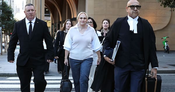 Smiles as Rebel Wilson set to testify in fight with co-star