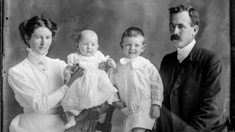 Reverend Ivo Edgar Bertram, pictured with wife Evelyn and sons George and James, is among the unnamed deceased in the vaults. 