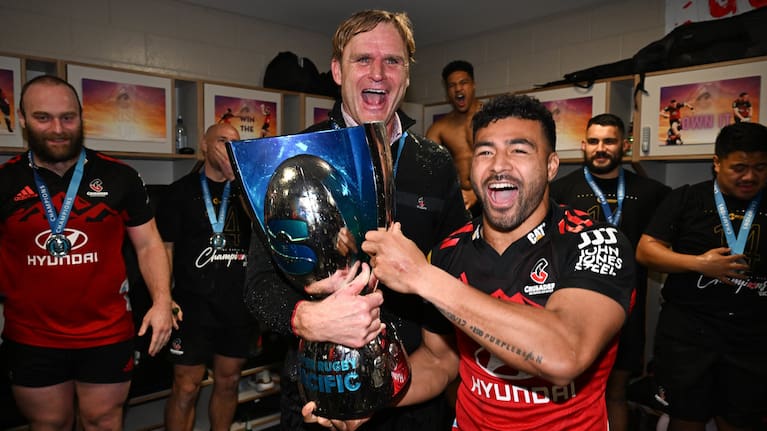 Scott Robertson celebrates leading the Crusaders to their seventh consecutive title alongside Richie Mo'unga in 2023.