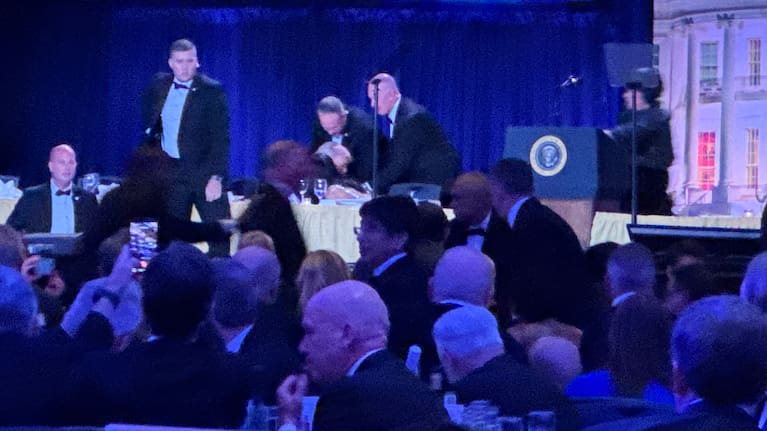 Secret service agents respond during the White House Correspondents Dinner, Saturday, April 25, 2026