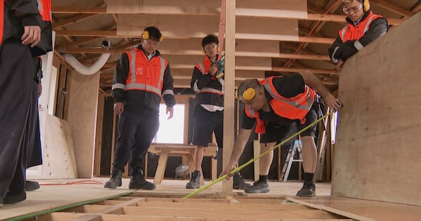 Students help build teacher housing at Auckland school amid shortage