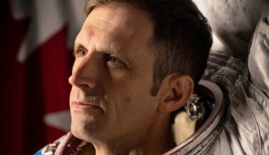an astronaut in a white spacesuit
