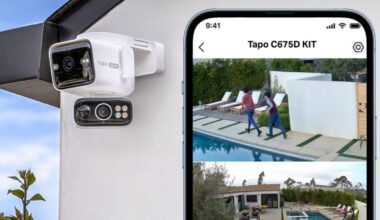 Tapo's dual camera on a white exterior wall with a phone showing views from the cam.