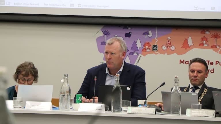 Tauranga Mayor Mahé Drysdale and Western Bay of Plenty Mayor James Denyer at a joint council meeting to discuss the future of local water services.