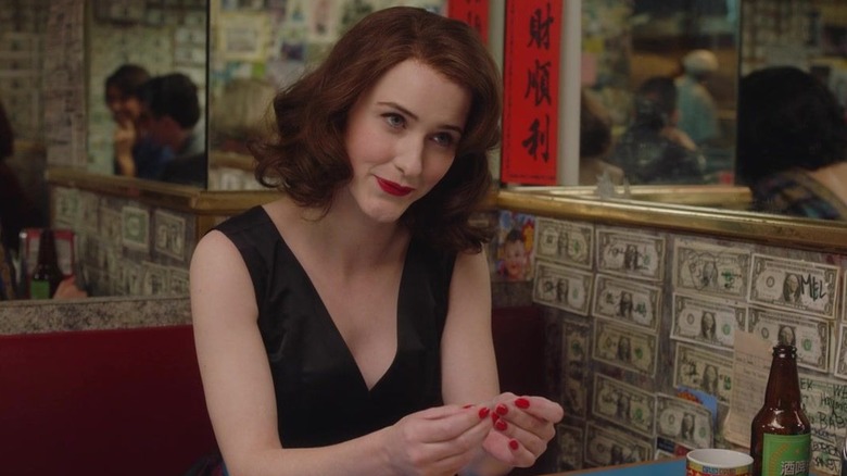 Midge Maisel sitting in a Chinese restaurant in The Marvelous Mrs. Maisel