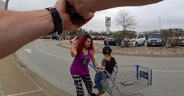 US police shoot woman who grabbed boy, slashed him with knife
