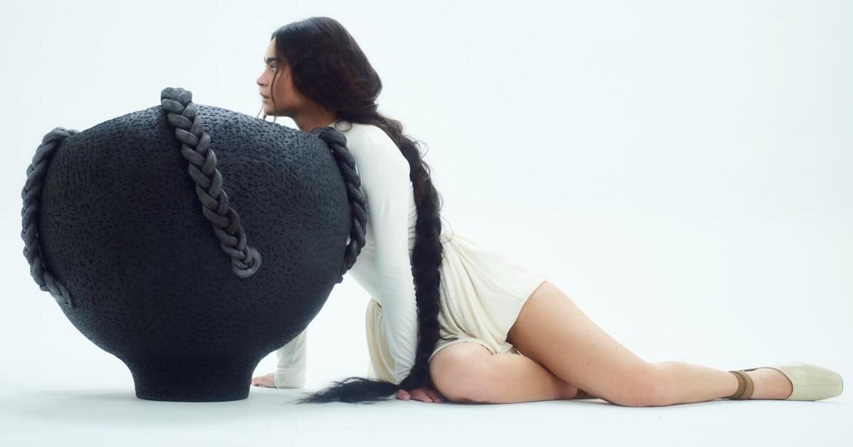 interlaced wood, metal, and fiber explore braiding as construction method in trenzar