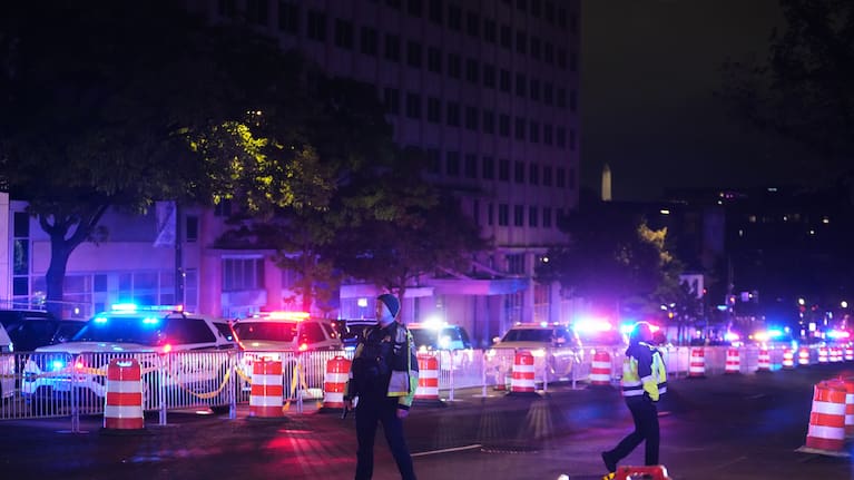 Law enforcement respond to an incident at the Washington Hilton during the White House Correspondents Dinner
