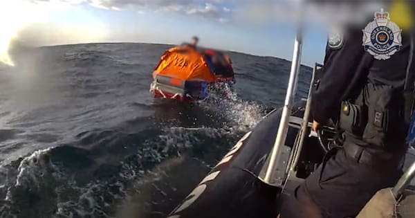 Queensland divers saved after drifting for 20 hours in rough waters