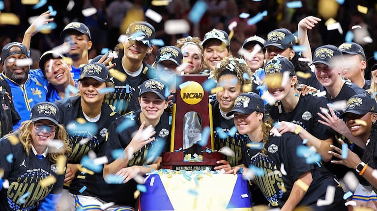 Members of the UCLA Bruins pose with the trophy after their victory against the South Carolina Gamecocks in the National Championship of the NCAA Women's Basketball Tournament at Mortgage Matchup Center on April 05, 2026 in Phoenix, Arizona.