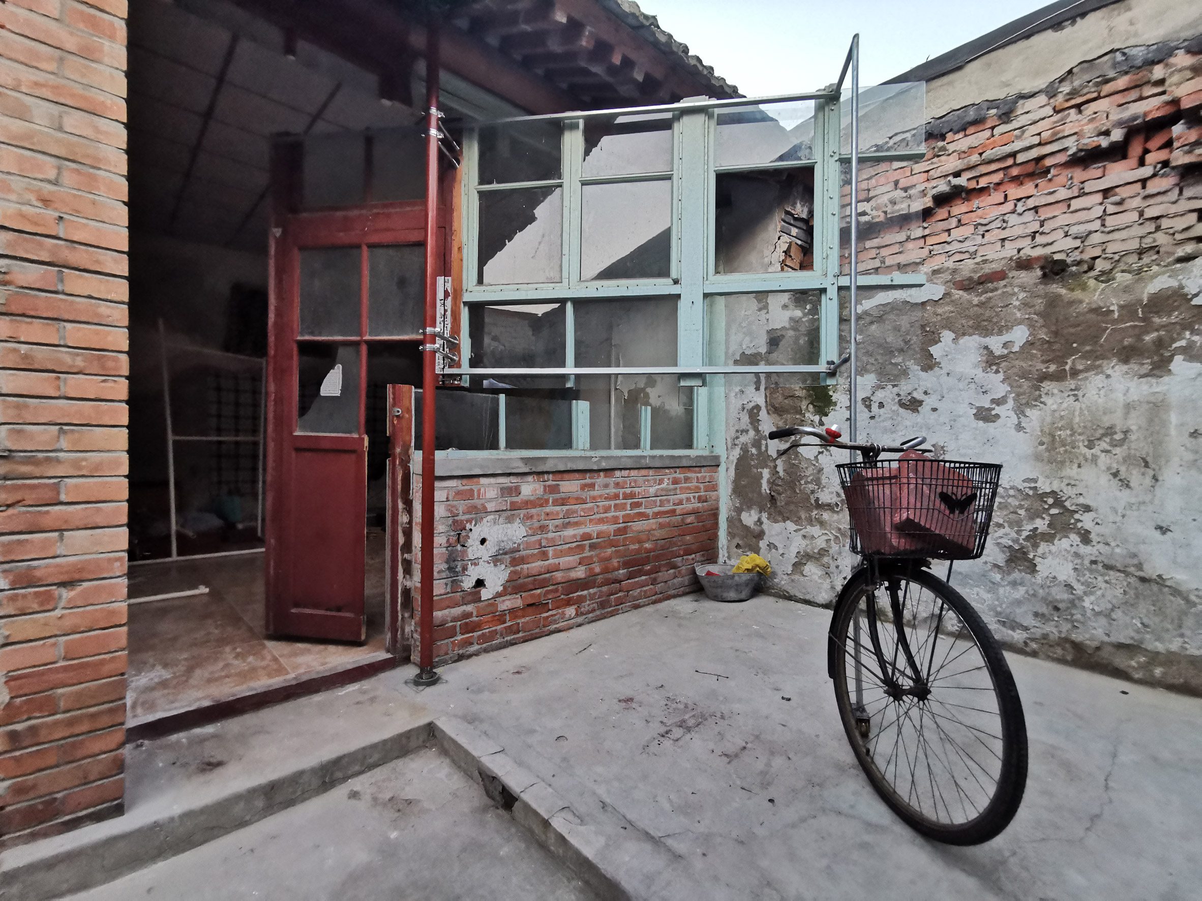 a photograph of a bike outside a building