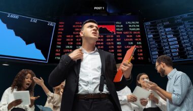 A stock trader holding a red folder looks worried on the floor of a stock exchange.
