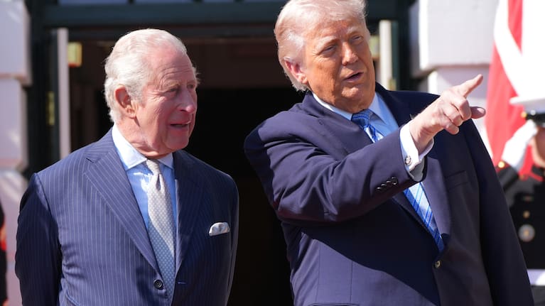 US President Donald Trump and Britain's King Charles III talk at the White House.