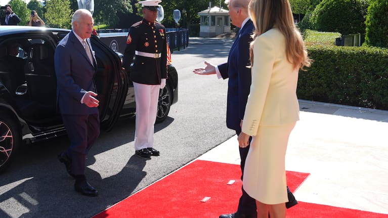 US President Donald Trump and first lady Melania Trump greet Britain's King Charles III and Queen Camilla as they arrive at the White House.