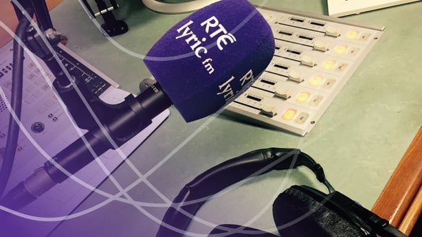 Close up of a microphone in a radio studio with purple cover and RTÉ lyric fm written on it