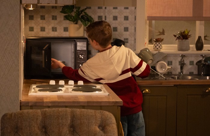 Bertie checks the microwave in Coronation Street