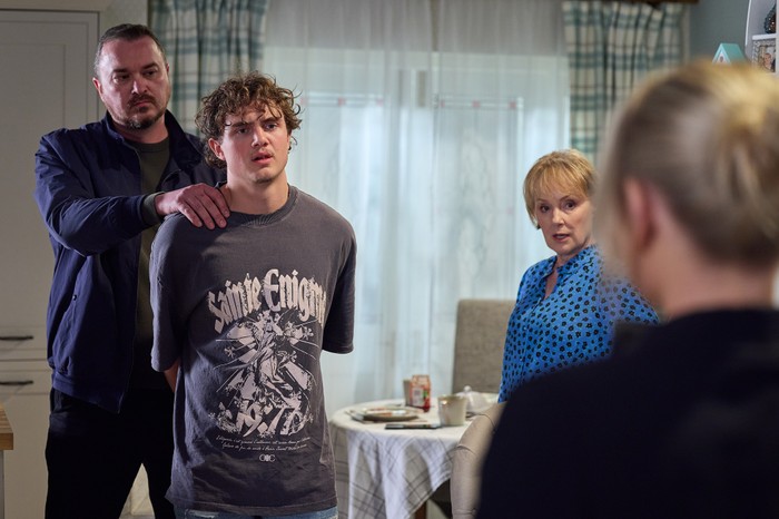 A police officer arrests Brody as Sally watches on in Coronation Street