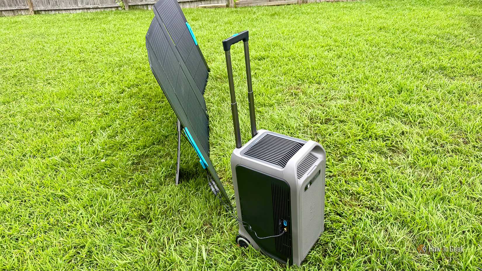 Anker SOLIX F3000 Portable Power Station and Anker SOLIX PS400 Portable Solar Panel on grass.