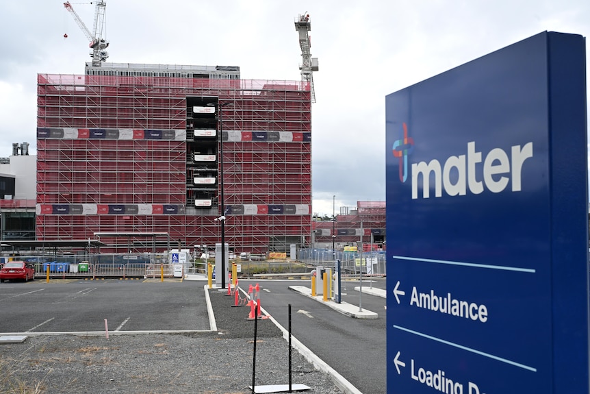 The Mater Springfield public hospital in construction, and a Mater sign with 'Ambulance' and 'Loading' markers