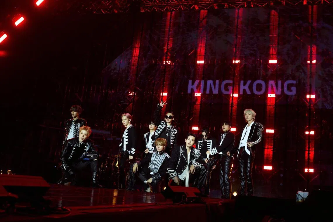 K-pop boy group Treasure, comprising (from left) Jihoon, So Jung-hwan, Yoshi, Yoon Jae-hyuk, Doyoung, Choi Hyun-suk, Junkyu, Haruto, Park Jeong-woo and Asahi, performing in Seoul in October 2025.