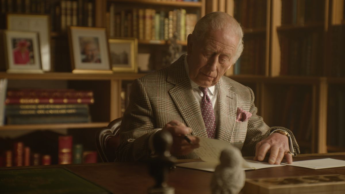 King Charles sits at his desk at Balmoral penning a handwritten letter to Sir David Attenborough