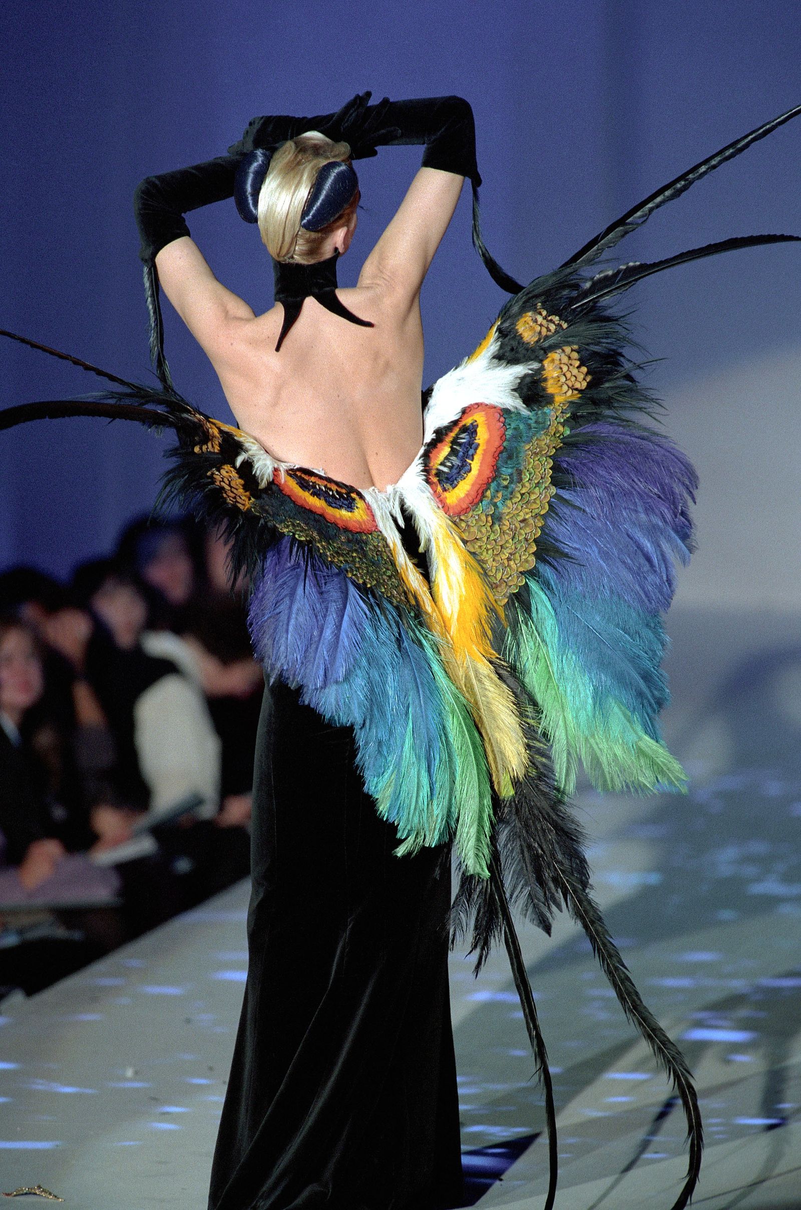 Image may contain Clothing Costume Person Adult Performer Solo Performance Dancing Leisure Activities and Crowd