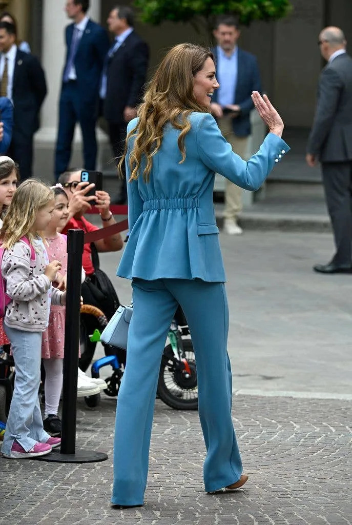 The Princess of Wales waves at crowds on her big arrival
