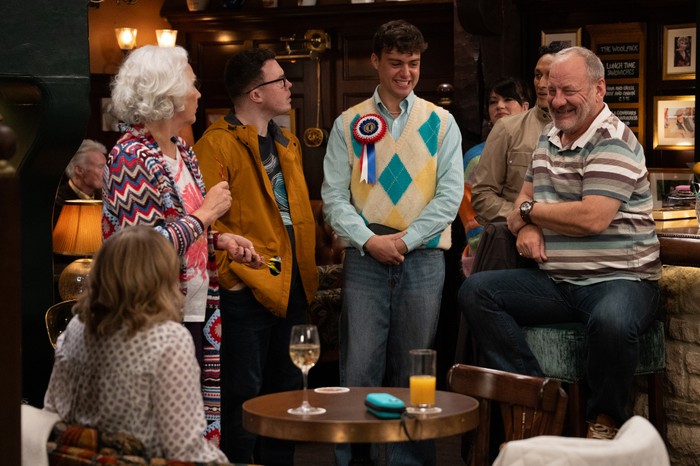 13_05_emm_lewis Lewis, Vinny, Jimmy and Mandy stand in The Woolpack in Emmerdale