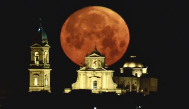 Flower Moon by Giovanni Passalacqua, Basilica della Santissima Annunziata, Ispica, Sicily, 1 May 2026, 05:23 local time. Equipment: Canon EOS R DSLR camera, Sigma 600mm lens, Manfrotto tripod. Exposure: f/6.3, ISO 400, 0.8s. Software: Photoshop