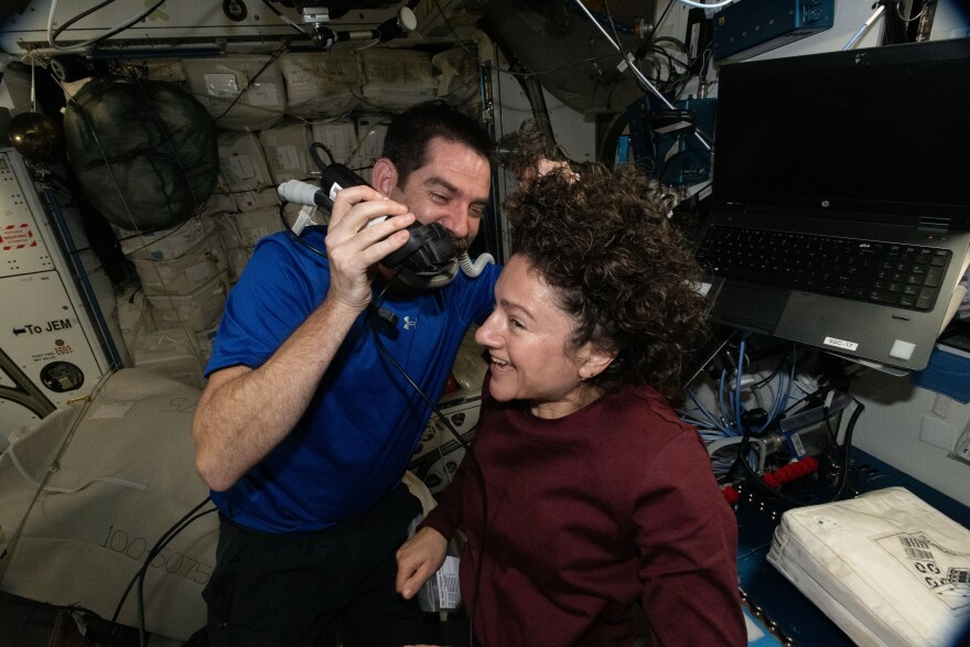 FILE: Weekends on the International Space Station are for housecleaning and haircuts. NASA astronaut Jack Hathaway trims the hair of fellow NASA astronaut Jessica Meir, both Expedition 74 flight engineers, using an electric razor attached to a vacuum that collects loose clippings to keep the station’s atmosphere clean in microgravity on March 1, 2026.